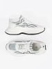 Bílo-zelené sneakersy s ozdobnými částmi