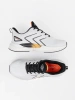 Bílo-černé sportovní boty s oranžovými částmi